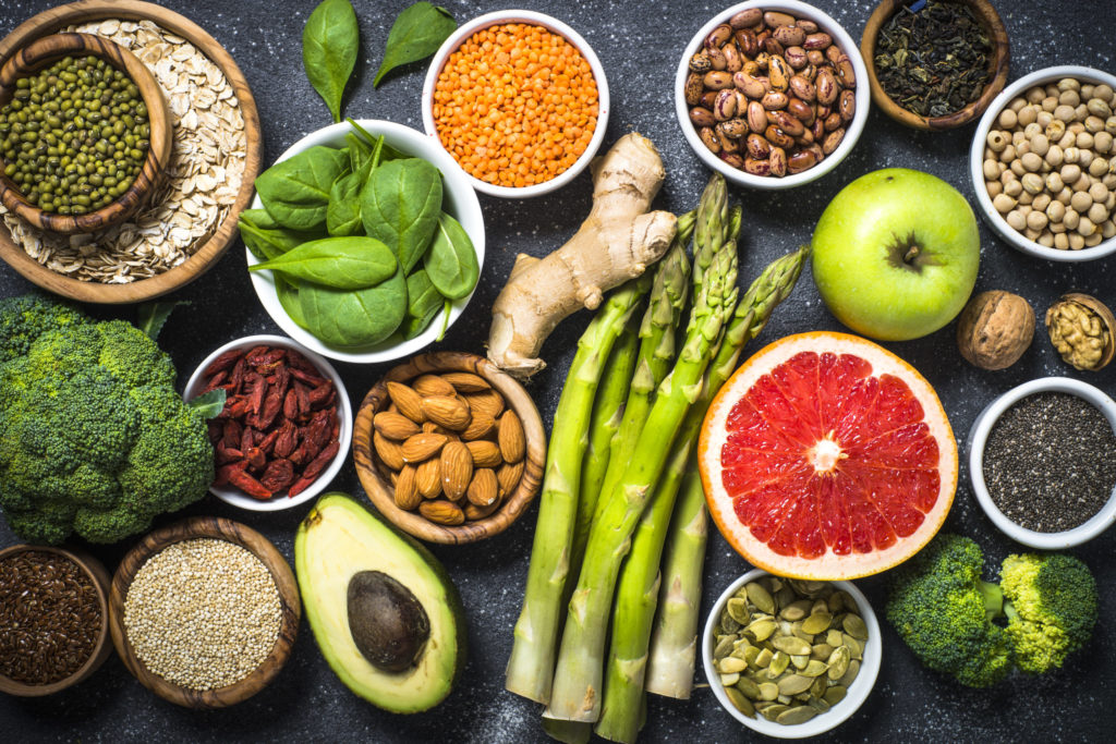 Superfoods on black stone background